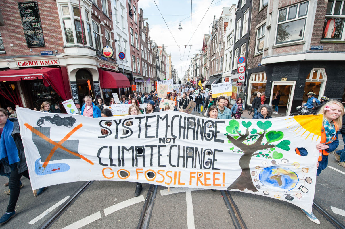 Thousands take part in the "People's Climate March" to call for an ambitious climate policy, on April 29, 2017, in Amsterdam.