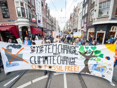 Thousands take part in the "People's Climate March" to call for an ambitious climate policy, on April 29, 2017, in Amsterdam.