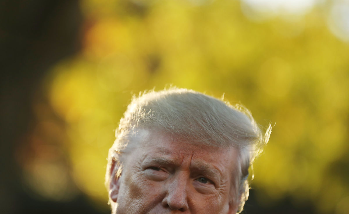 President Trump talks to reporters before departing the White House