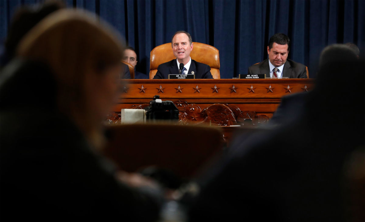 House Intelligence Committee Chairman Adam Schiff gives his closing statement as ranking member Rep. Devin Nunes, right, listens in the House Intelligence Committee on Capitol Hill in Washington, D.C on November 19, 2019.