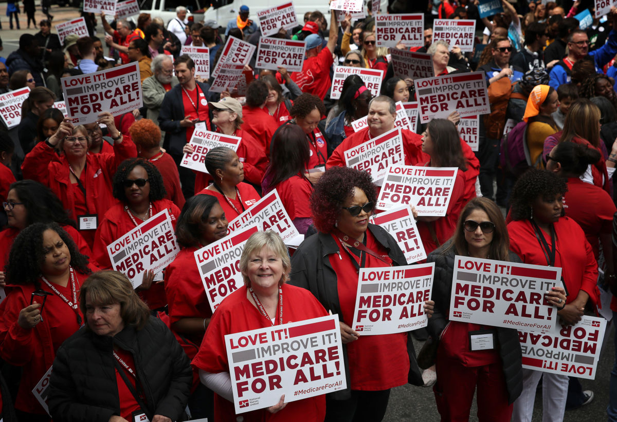 Protesters supporting Medicare for All hold a rally outside PhRMA headquarters, April 29, 2019, in Washington, D.C.