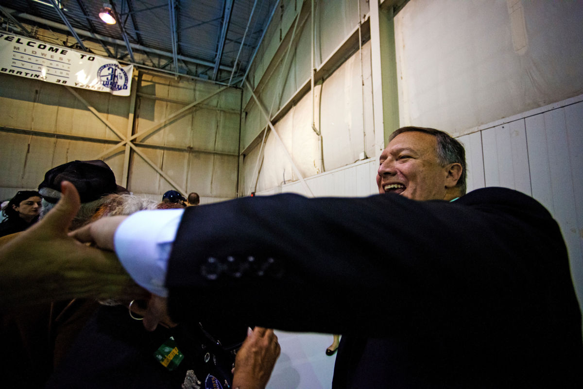 Mike Pompeo greets and shakes hands with supporters at a rally for Senator Pat Roberts in Wichita, Kansas, October 28, 2014.