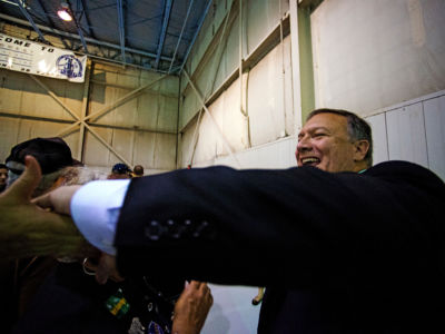 Mike Pompeo greets and shakes hands with supporters at a rally for Senator Pat Roberts in Wichita, Kansas, October 28, 2014.