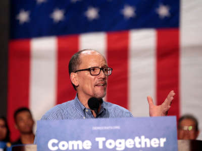 Chairman Tom Perez speaks with supporters at a "Come Together and Fight Back" rally hosted by the Democratic National Committee at the Mesa Amphitheater in Mesa, Arizona, April 21, 2017.