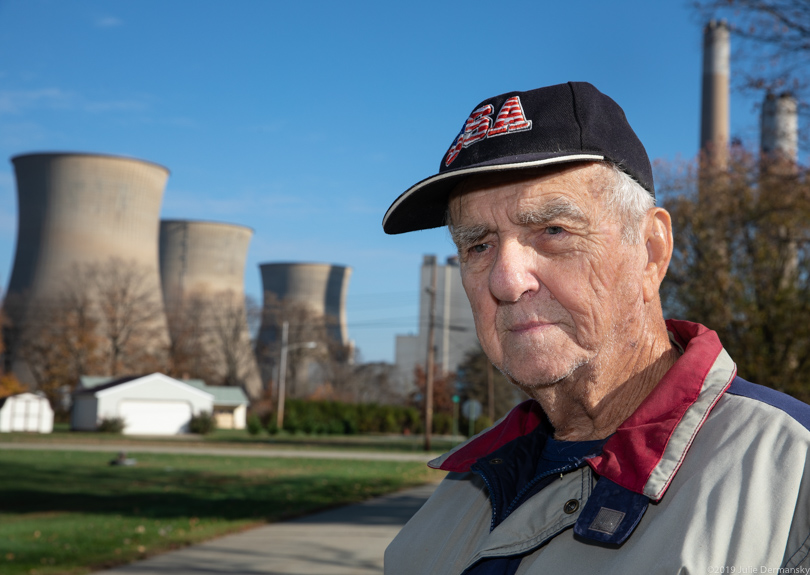 William Green on a walk in Shippingport, with the Bruce Mansfield Coal Plant behind him.