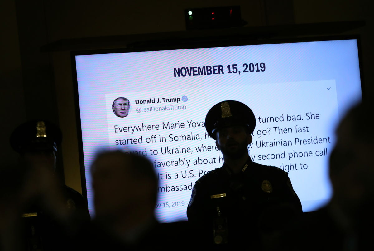 A tweet from Donald Trump created while former U.S. Ambassador to Ukraine Marie Yovanovitch's testifies before the House Intelligence Committee is shown in the Longworth House Office Building on Capitol Hill on November 15, 2019, in Washington, D.C.