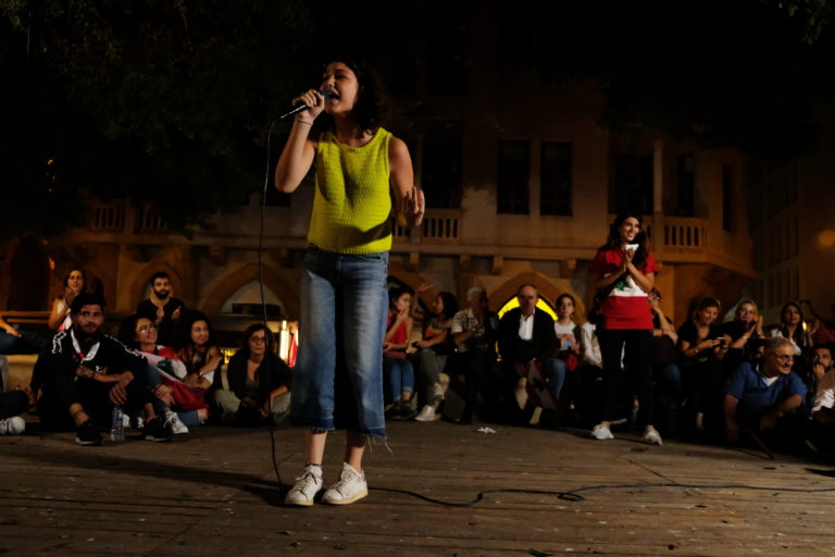 Fifteen-year-old Aya addresses the crowd in Beirut.