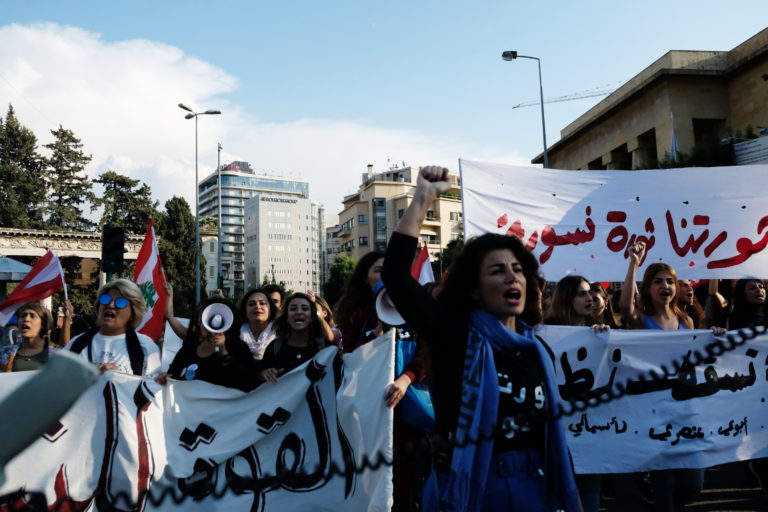 A feminist demonstration marching through the streets of Beirut.