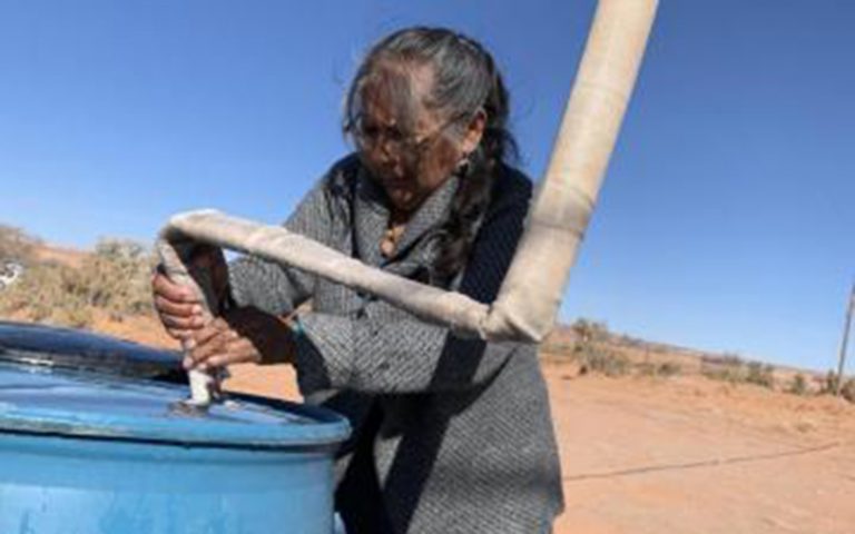 Darlene Yazzie, a retired community health worker, says hauling water, firewood and trash – and using an outhouse – are just a few of the things that make life hard on the Navajo reservation.