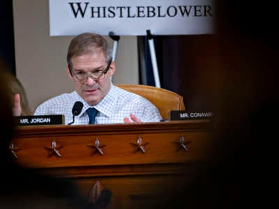 Rep. Jim Jordan speakis into a microphone while seated during a hearing