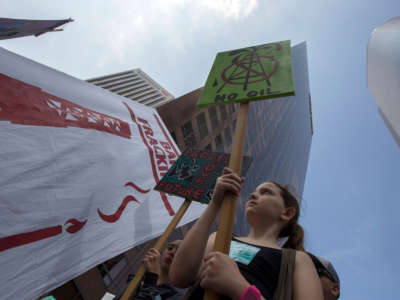 People take part in the March to Break Free from Fossil Fuels on May 14, 2016, in Los Angeles, California.