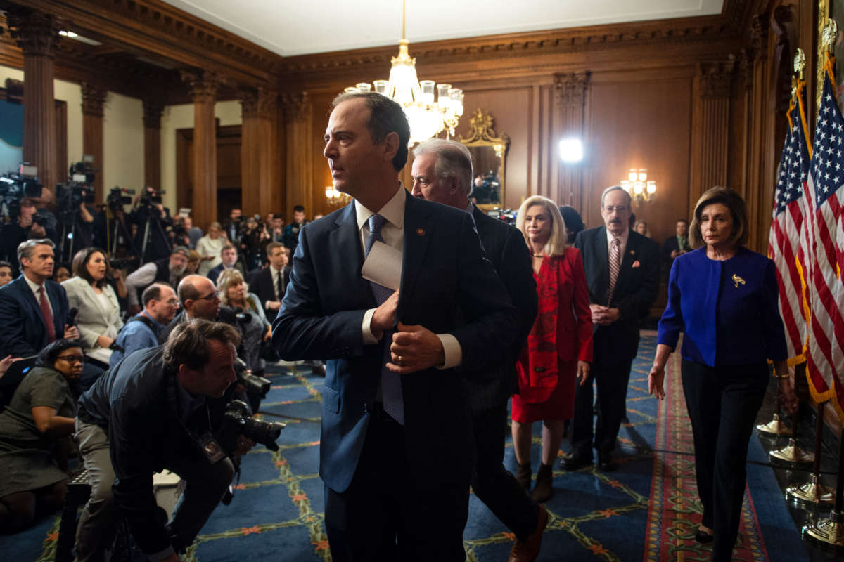 Rep. Adam Schiff, Chairman of the House Intelligence Committee, departs from a news conference that unveiled articles of impeachment against President Trump for abuse of power and obstruction of Congress, in the Capitol on December 10, 2019.
