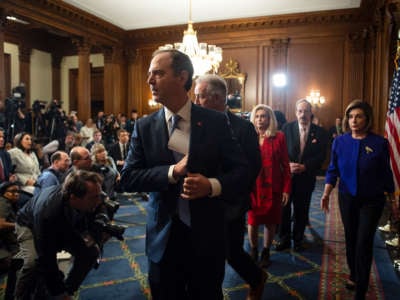 Rep. Adam Schiff, Chairman of the House Intelligence Committee, departs from a news conference that unveiled articles of impeachment against President Trump for abuse of power and obstruction of Congress, in the Capitol on December 10, 2019.