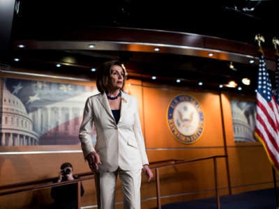 Nancy Pelosi stands alone