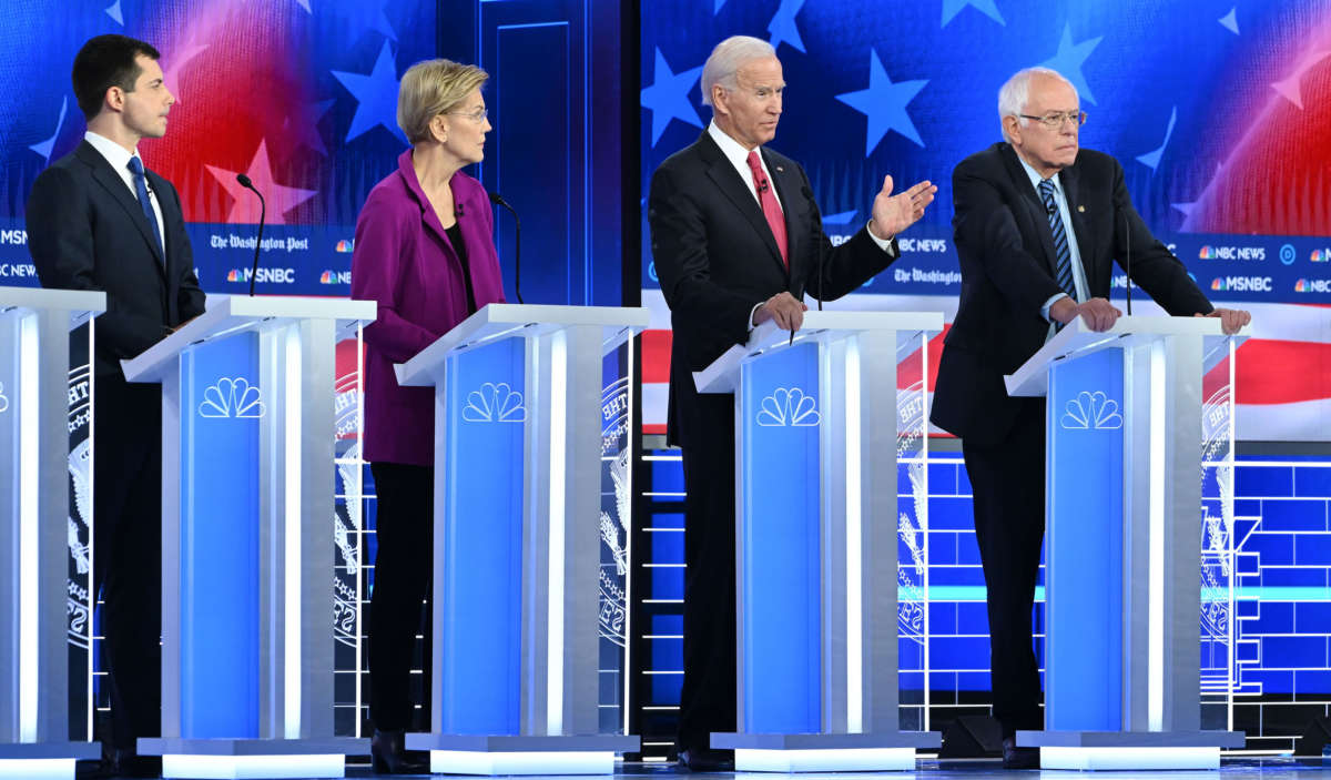 From left, Democratic presidential hopefuls Mayor of South Bend Pete Buttigieg, Massachusetts Senator Elizabeth Warren, Former Vice President Joe Biden and Vermont Senator Bernie Sanders participate in the fifth Democratic primary debate of the 2020 presidential campaign season in Atlanta, Georgia, on November 20, 2019.