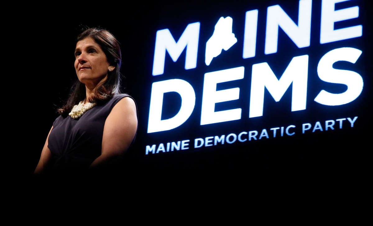 House Speaker Sara Gideon stands onstage during the biannual Democratic state convention on Saturday in Lewiston, May 19, 2018.