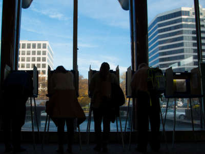 People cast their vote at Milwaukee City Hall, November, 8, 2016, in Milwaukee, Wisconsin.