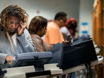 Voters cast their ballots at the Rothschild Elementary School library, Precinct 116, in Columbus, Georgia, on November 6, 2018.