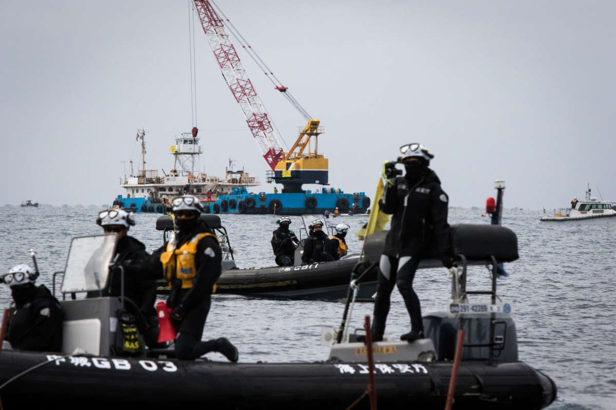 Japan Coast Guard is seen during a rally against the U.S. airbase construction in Oura Bay, Okinawa, Japan, on February 7, 2017.