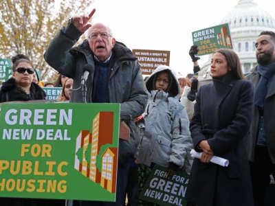 Democratic presidential candidate Sen. Bernie Sanders and Rep. Alexandria Ocasio-Cortez hold a news conference to introduce legislation to transform public housing as part of their Green New Deal proposal outside the U.S. Capitol November 14, 2019, in Washington, D.C.
