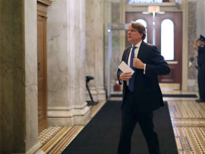 Then-White House Counsel Don McGahn heads to a meeting at the U.S. Capitol, July 11, 2018.