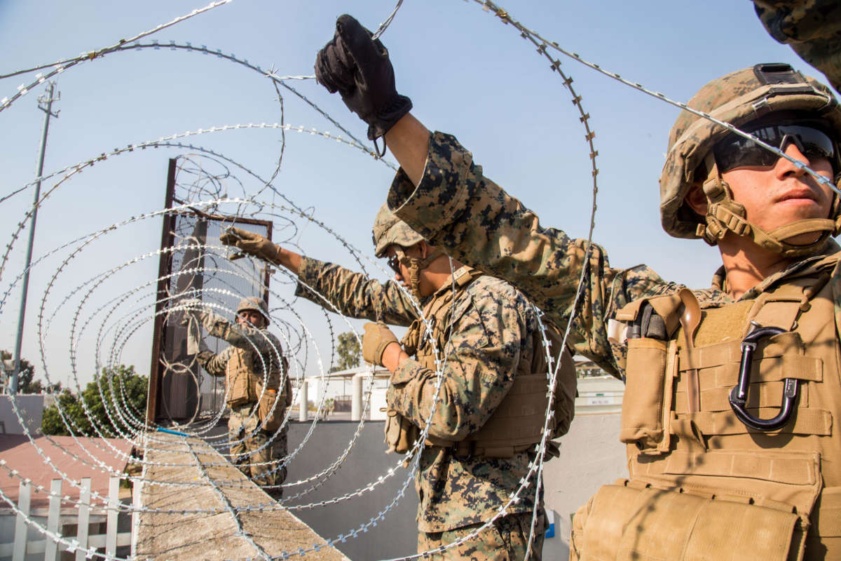 U.S. Marines place concertina wire at the Otay Mesa Port of Entry in California on November 11, 2018.