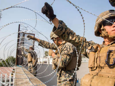 U.S. Marines place concertina wire at the Otay Mesa Port of Entry in California on November 11, 2018.