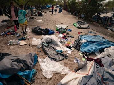 Officials used machetes to destroy tents in a refugee camp in Matamoros, Mexico.