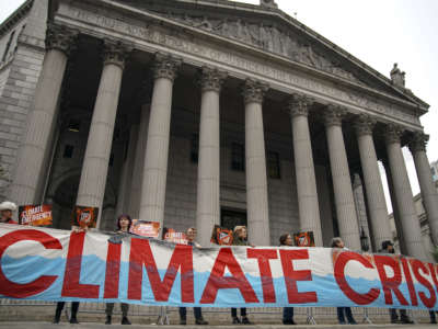 Environmental activists rally for accountability for fossil fuel companies outside of New York Supreme Court on October 22, 2019, in New York City.