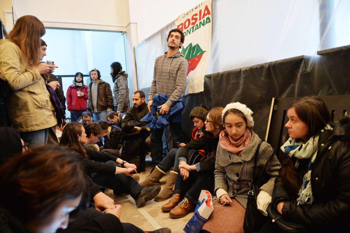 Demonstrators protesting against a gold mining project occupy the People Advocate's headquarters in Bucharest, on December 10, 2013.