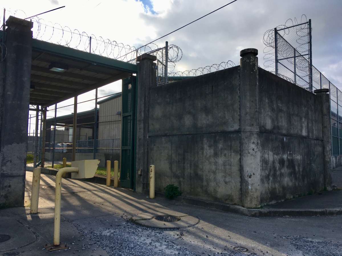 The entrance to the Temporary Detention Center at the Orleans Justice Center in New Orleans, Louisiana. Built in the decade after Hurricane Katrina, this “temporary” row of squat, metal-sided structures were supposed to shut down in 2017.