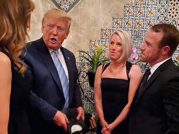 President Trump pictured with retired Navy SEAL Eddie Gallagher and his wife Andrea Gallagher.