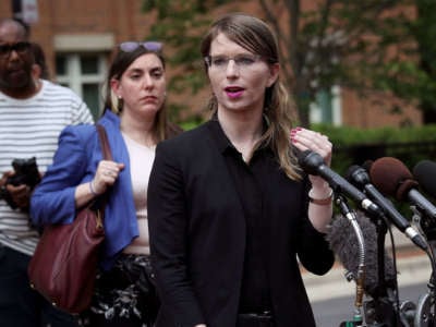 Former U.S. Army intelligence analyst Chelsea Manning addresses reporters before entering the Albert Bryan U.S federal courthouse, May 16, 2019, in Alexandria, Virginia.