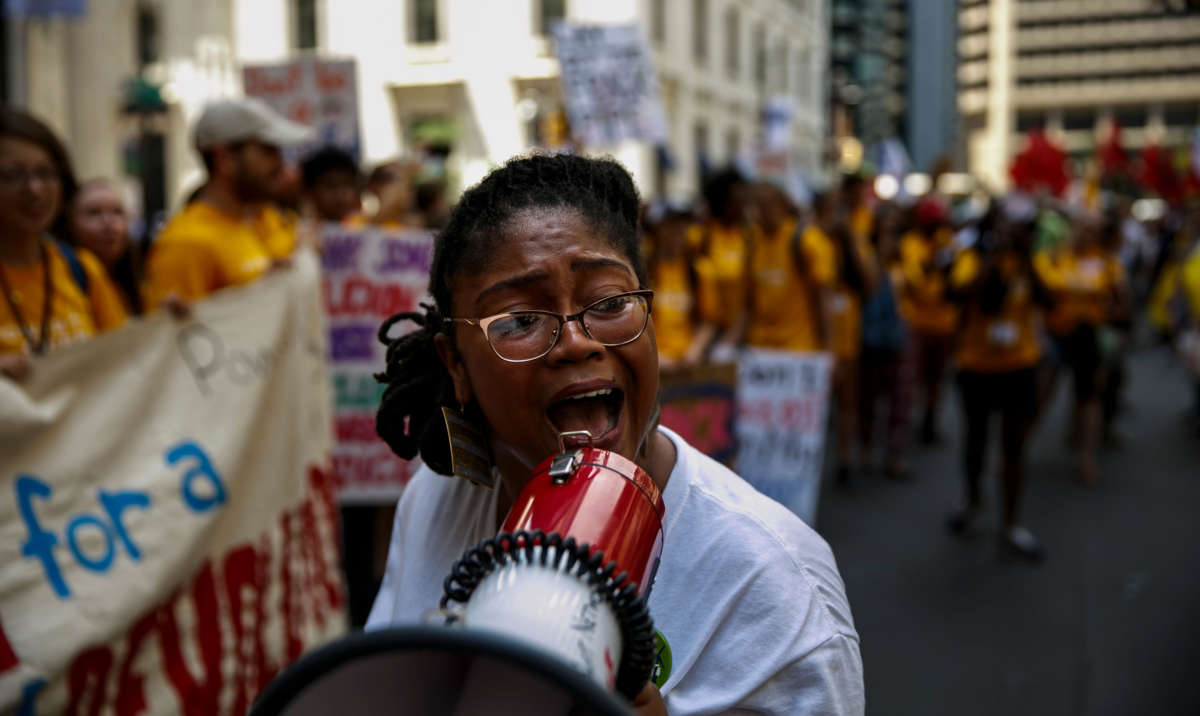 A protester fires up the crowd with chants during the Clean Energy March in Philadelphia, Pennsylvania, on July 24, 2016.