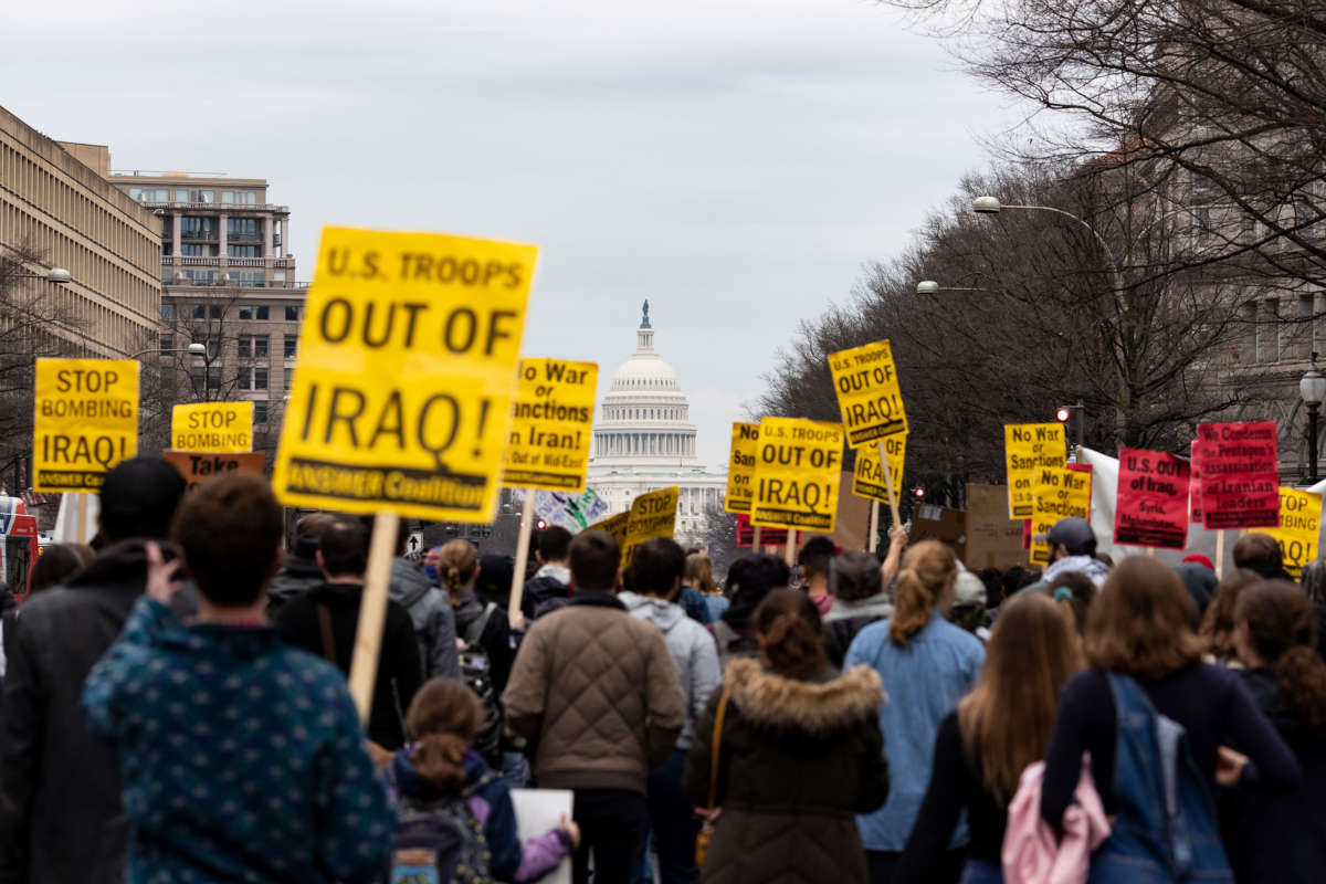 Antiwar protesters march during a demonstration against war in Iraq and Iran on January 4, 2020, in Washington, D.C.