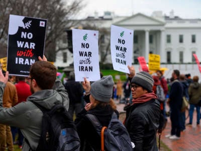 Anti-war activists protest in front of the White House in Washington, D.C., on January 4, 2020.