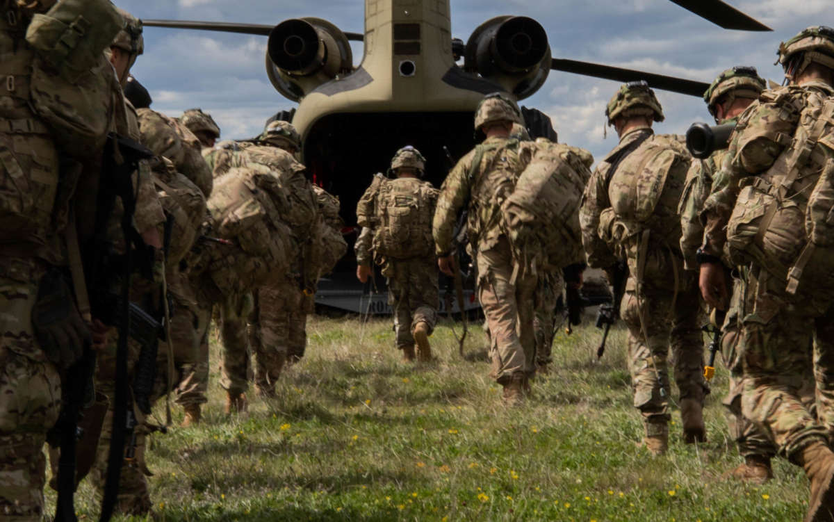 U.S. soldiers mount a CH-47 Chinook helicopter during an exercise at Udbina Airbase, Croatia, May 17, 2019.
