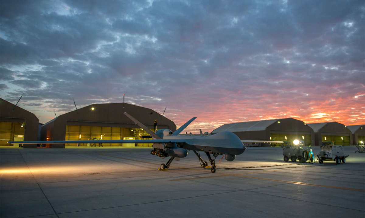 An MQ-9 Reaper drone of the sort used in the assassination of an Iranian military leader sits on the ramp at Kandahar Airfield, Afghanistan, December 6, 2015.