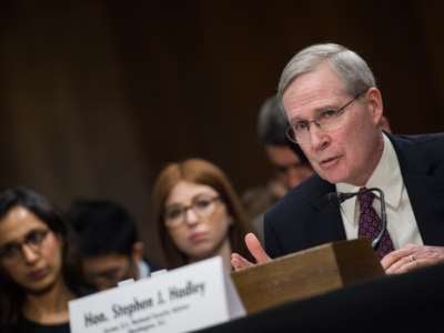 Stephen Hadley delivers remarks during a hearing