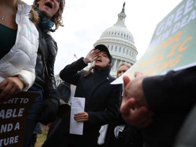 AOC begins a chant in front of the u.s. capitol building