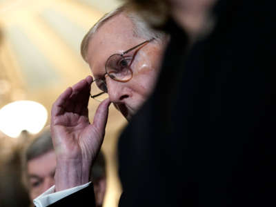 Senate Majority Leader Mitch McConnell waits to answer questions during a press conference at the U.S. Capitol