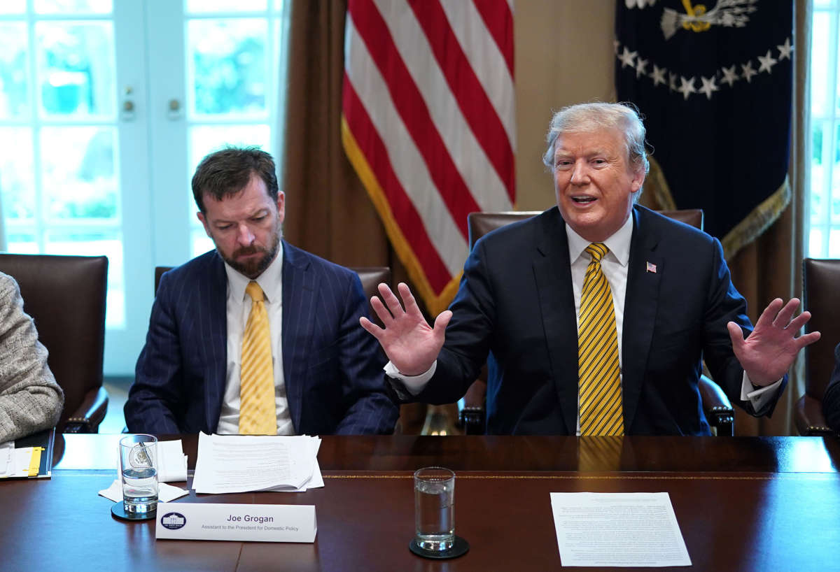 President Trump speaks beside Assistant to the President for Domestic Policy Joe Grogan in the Cabinet Room at the White House, April 4, 2019, in Washington, D.C.