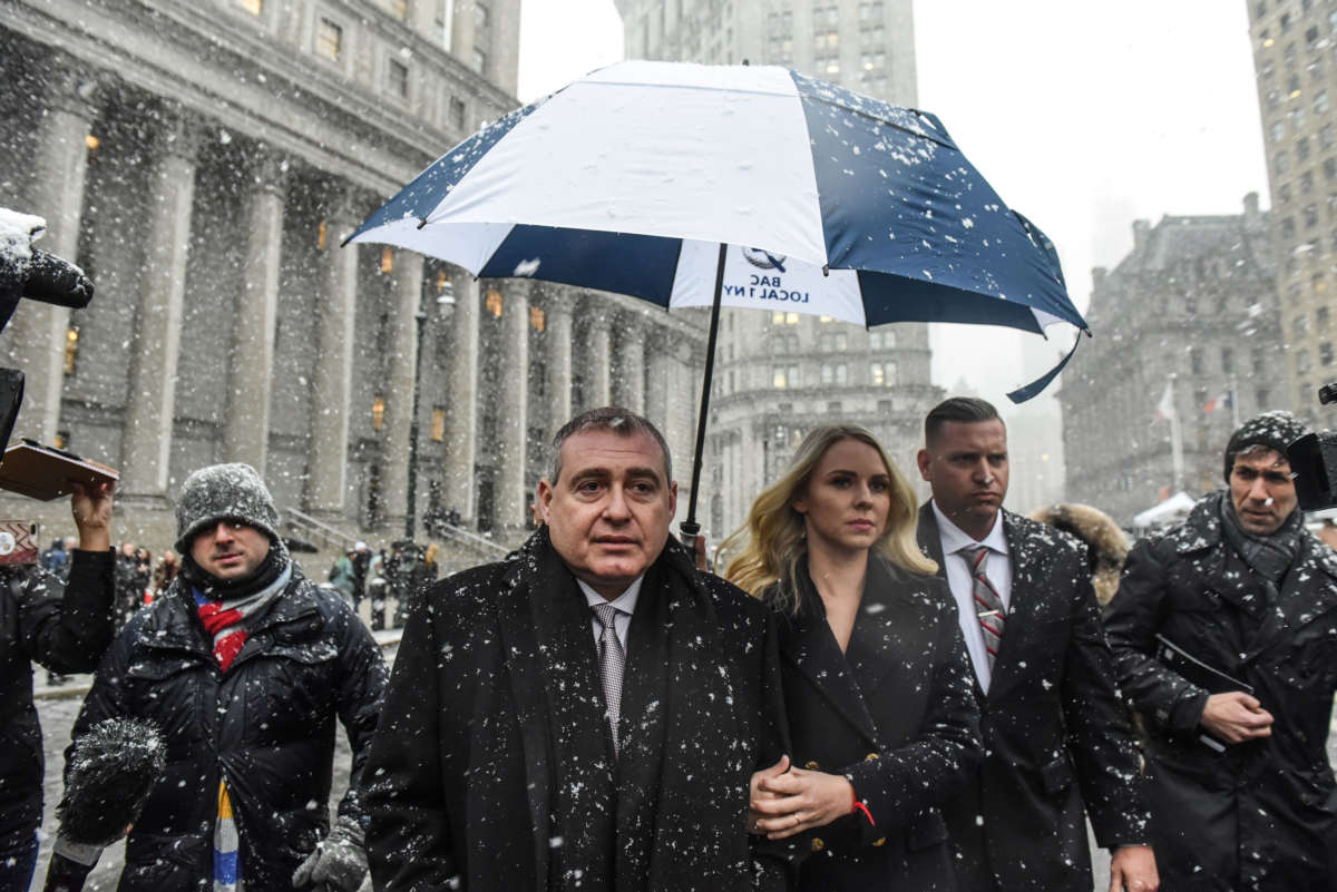 Lev Parnas departs federal court with his wife Svetlana Parnas on December 2, 2019, in New York City.