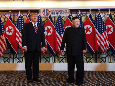 President Trump and North Korea's leader Kim Jong Un arrive for a meeting at the Sofitel Legend Metropole hotel in Hanoi on February 27, 2019.