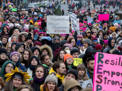 hundreds of marchers participate in the Womens March