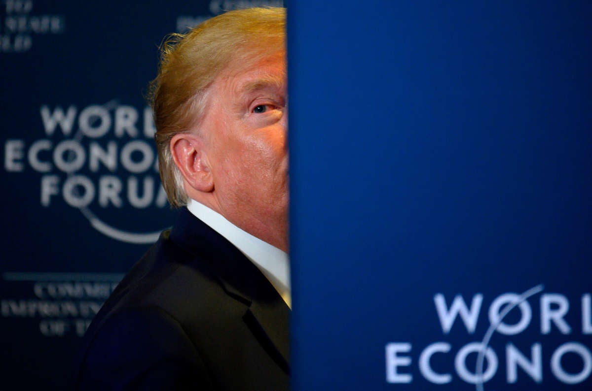 President Trump looks back as a question from the press is shouted after a press conference at the World Economic Forum in Davos, Switzerland, on January 22, 2020.