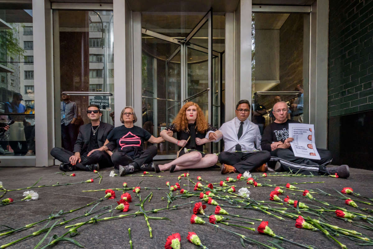 Protesters dropped flowers symbolizing the many lives lost to overdose at a protest on August 28, 2019, at Gov. Andrew Cuomo's New York City office to call for evidence-based overdose prevention policies that could save the lives of thousands of New Yorkers.