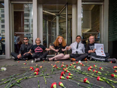 Protesters dropped flowers symbolizing the many lives lost to overdose at a protest on August 28, 2019, at Gov. Andrew Cuomo's New York City office to call for evidence-based overdose prevention policies that could save the lives of thousands of New Yorkers.
