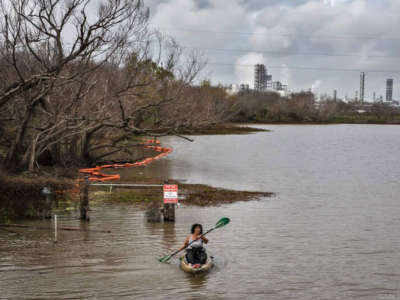 Diane Wilson kayaking to the fence line of Formosa’s Point Comfort plant to check for nurdles newly discharged from the plant on January 15, 2020.