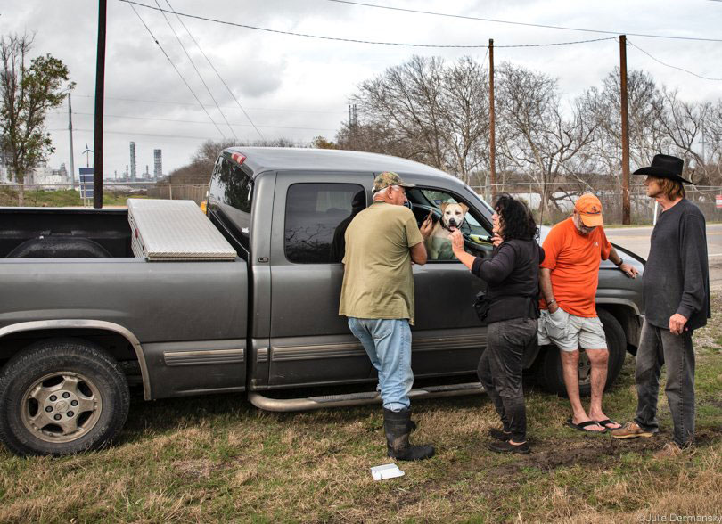 Diane Wilson with volunteers before their meeting across the street from Formosa’s Point Comfort manufacturing plant. 